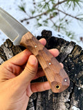 Cowboy knife with custom leather sheath for hunting and outdoor use